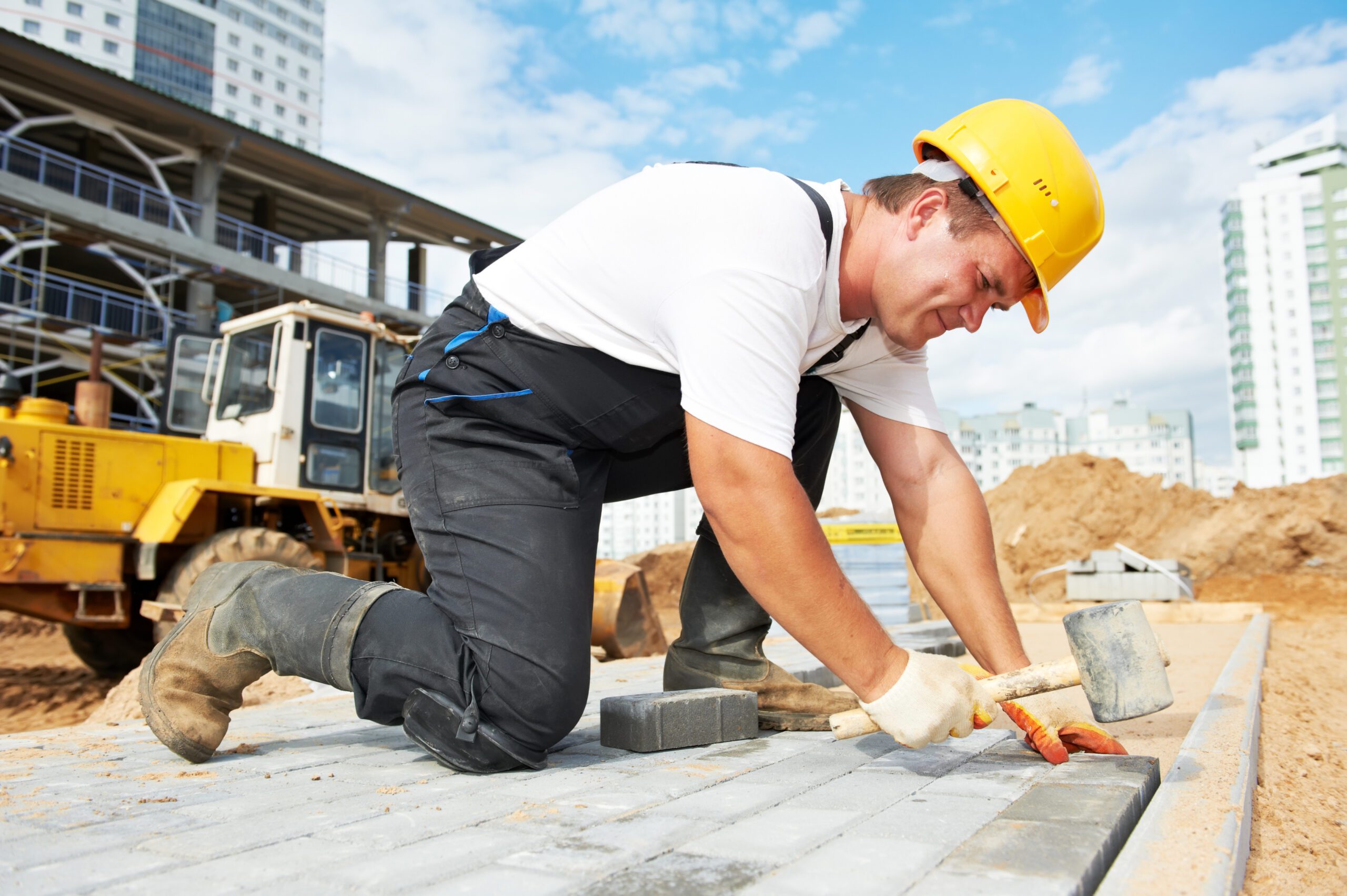 Mason Worker Making Sidewalk Pavement